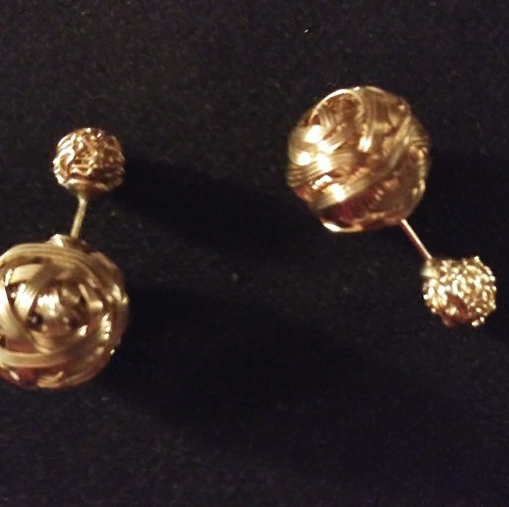 Goldtone earrings.